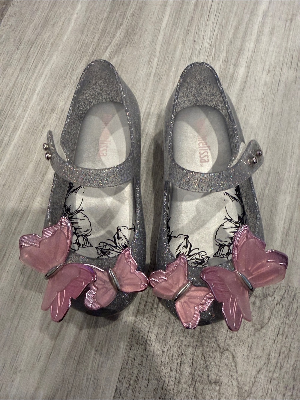 Melissa Glitter Mary Janes with Pink Butterfly Embellishments
